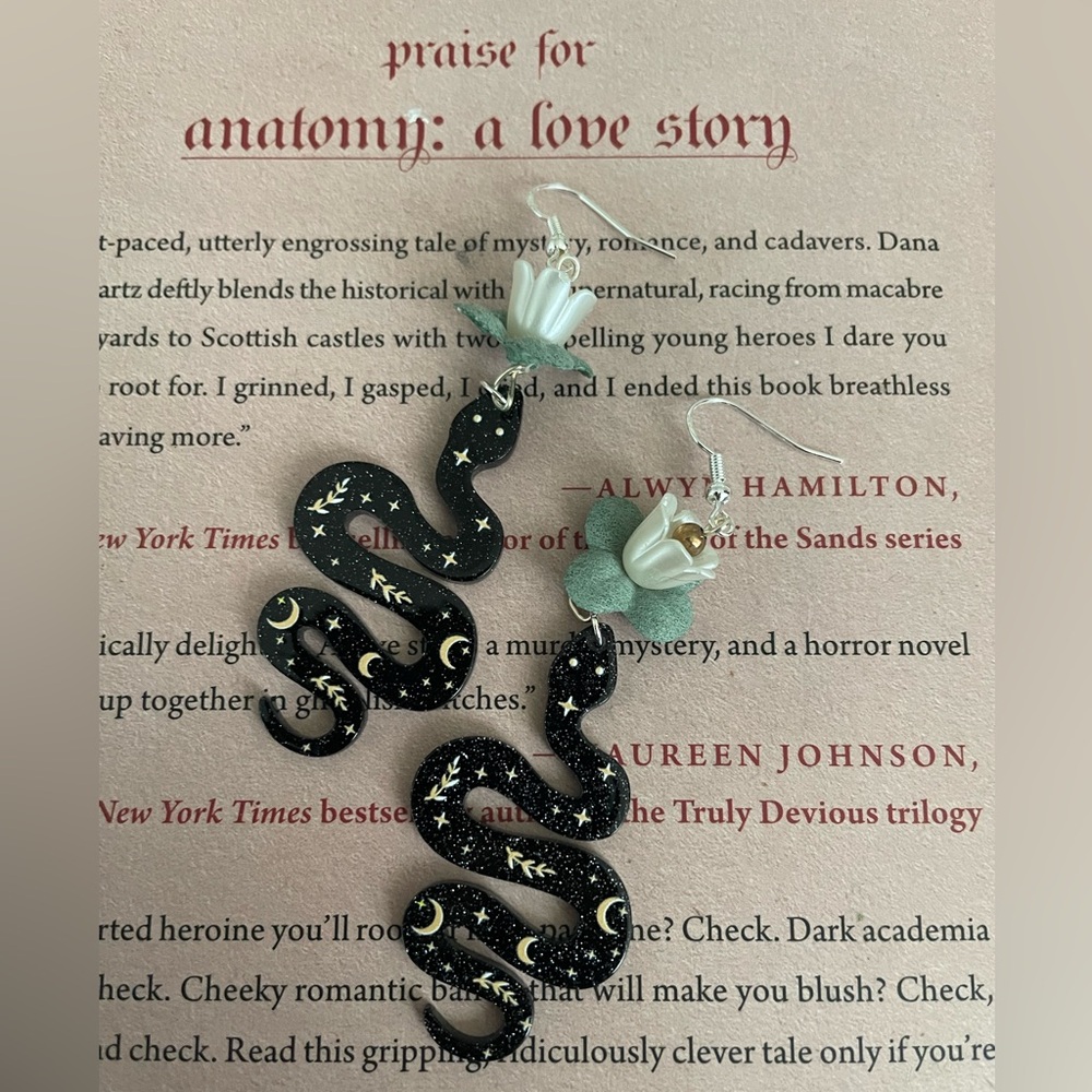 ⭐️Handmade Black Snake Earrings with white flowers.